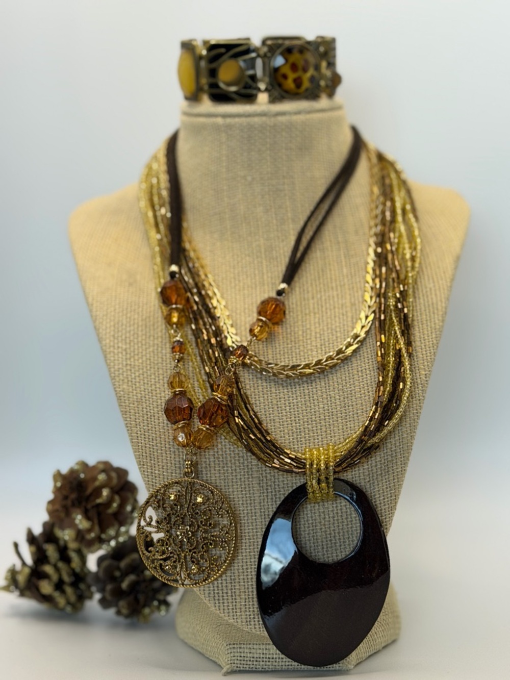 Bundle of 4- Multi-Strand Brown and Gold Pendant Necklace with Filigree Charm -